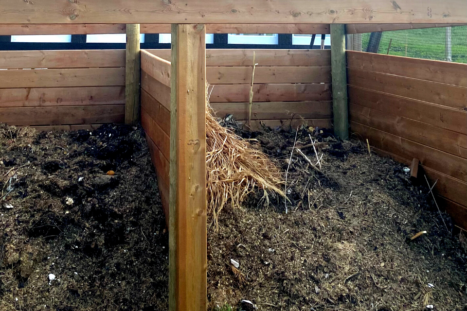 Two compost bays with straw mulch added