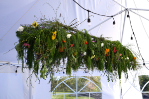 DIY garden flower arbor with greenery